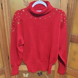 Elegant Red Turtleneck Sweater with Gold Accents